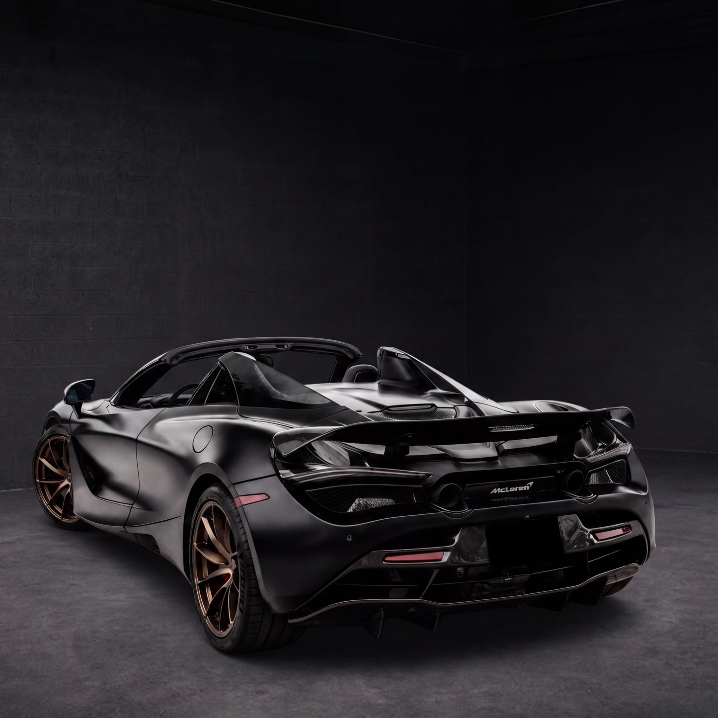McLaren 720S Spider Convertible | black backdrop | view 01 | source McLaren 720S Spider Convertible - Ark Exotics - 1x1.png