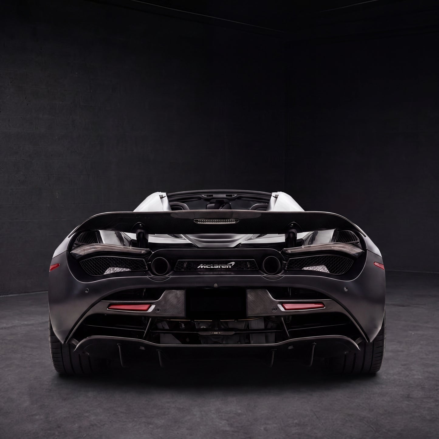 McLaren 720S Spider Convertible | black backdrop | view 04 | source hf_20260513_203719_4056549f-cbc0-47fd-ac61-fe8b900fb5d4 - 1x1.png