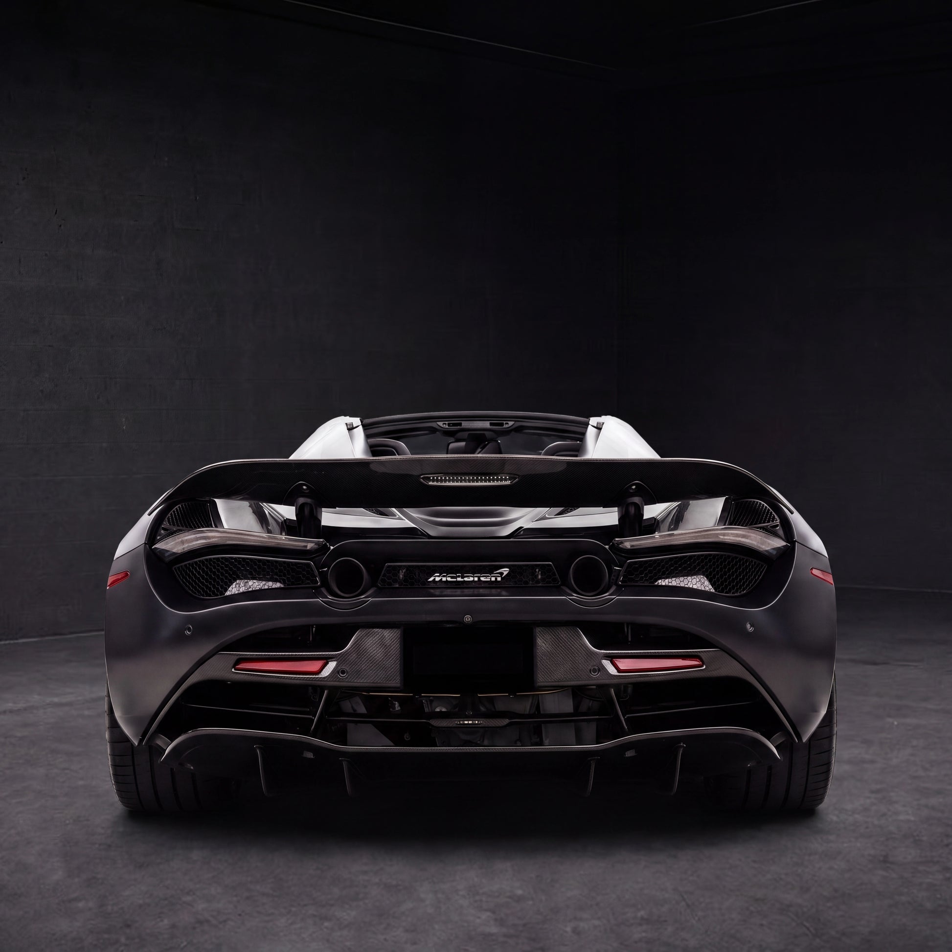 McLaren 720S Spider Convertible | black backdrop | view 04 | source hf_20260513_203719_4056549f-cbc0-47fd-ac61-fe8b900fb5d4 - 1x1.png