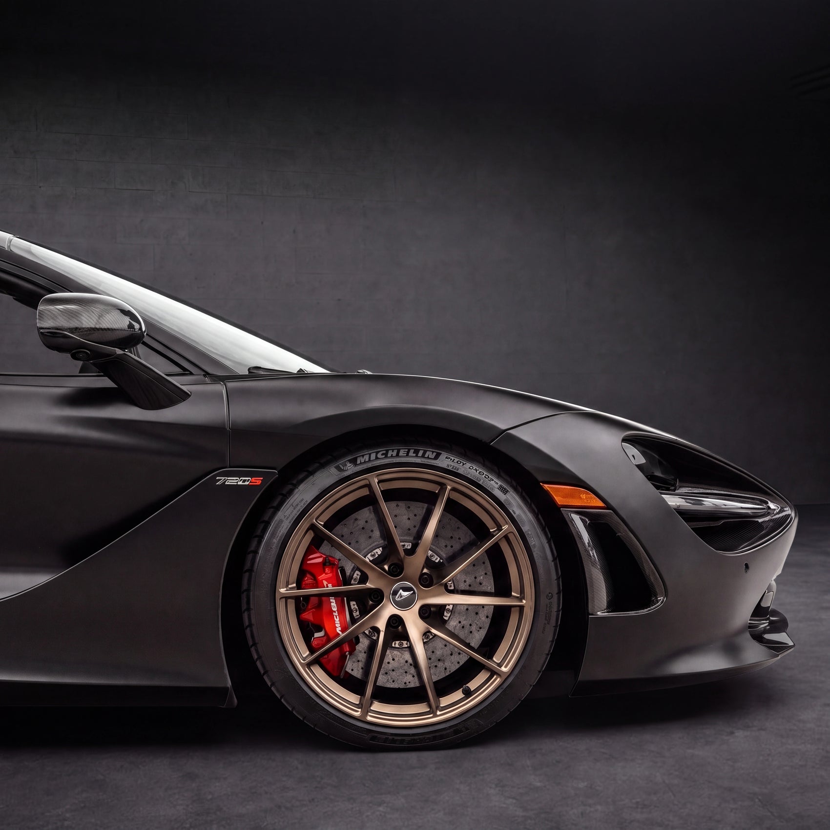McLaren 720S Spider Convertible | black backdrop | view 06 | source hf_20260513_204657_fbda19c0-c615-4c6b-bbd5-47c6eca6c8d7 - 1x1.png