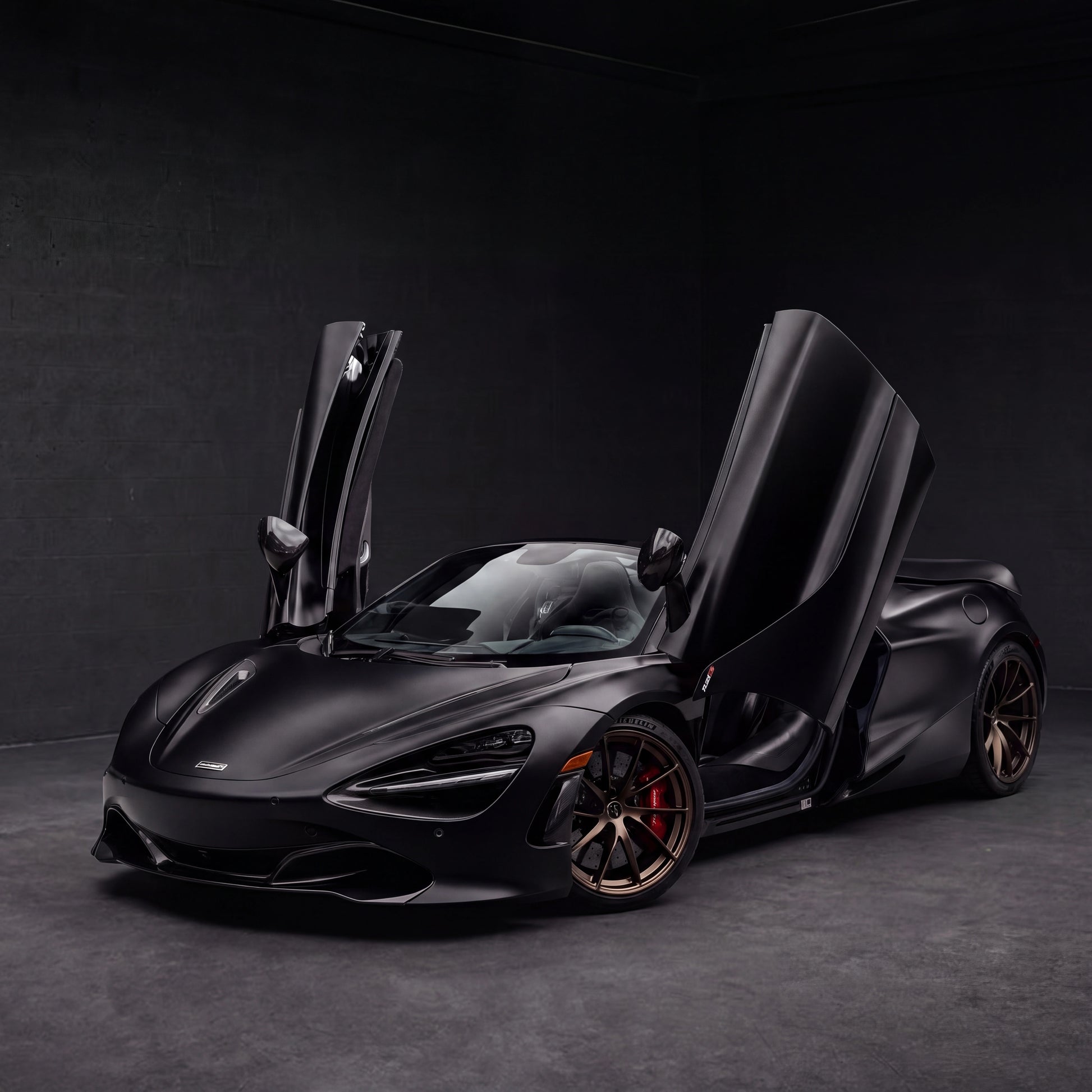 McLaren 720S Spider Convertible | black backdrop | view 11 | source mclaren-720s-spider-convertible-3405601 - 1x1.png