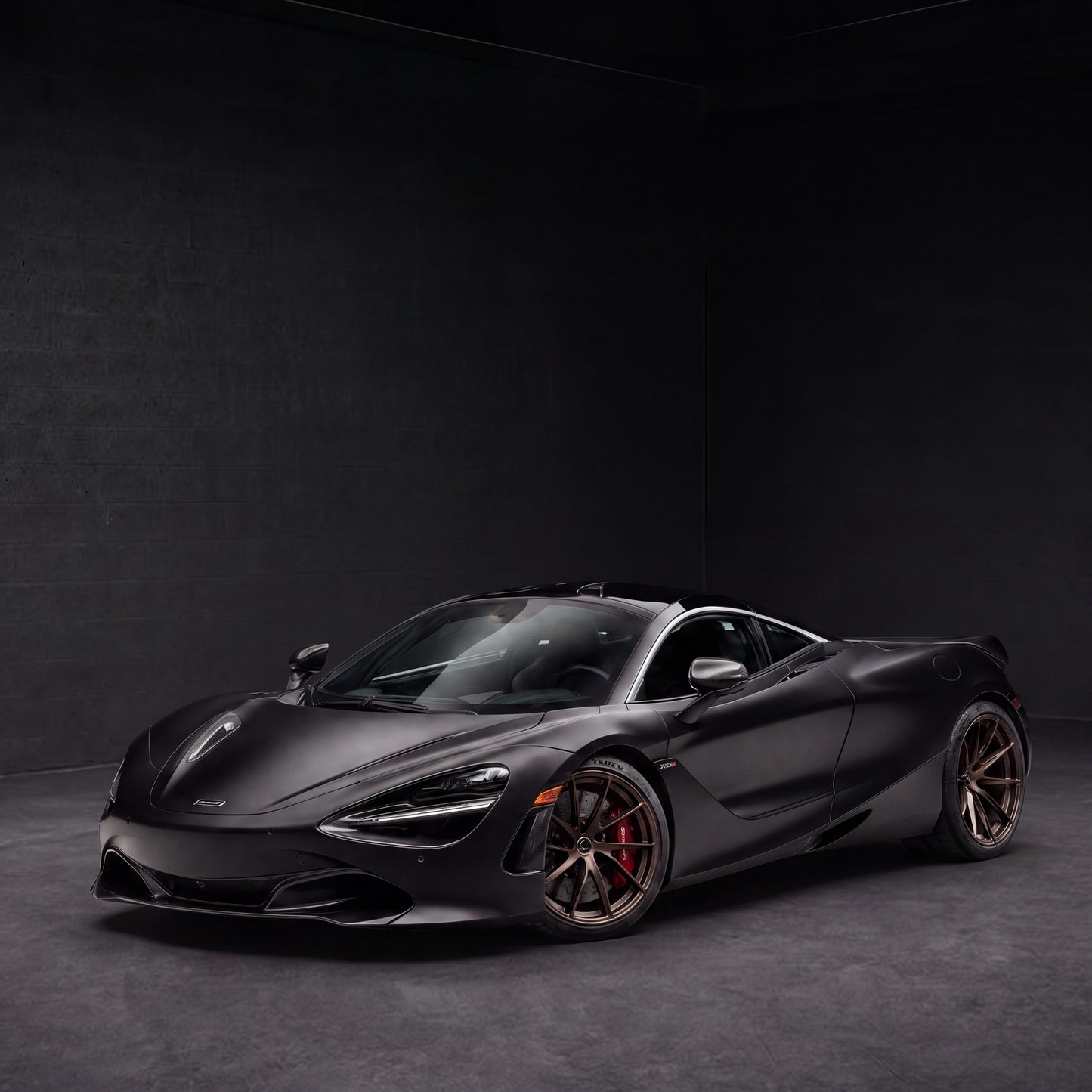 McLaren 720S Spider Convertible | black backdrop | view 12 | source mclaren-720s-spider-convertible-roof-down - 1x1.png