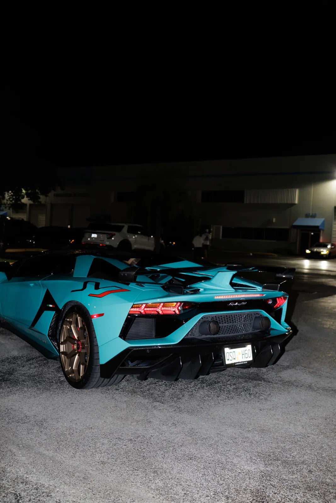 Blue Lamborghini Aventador SVJ at night