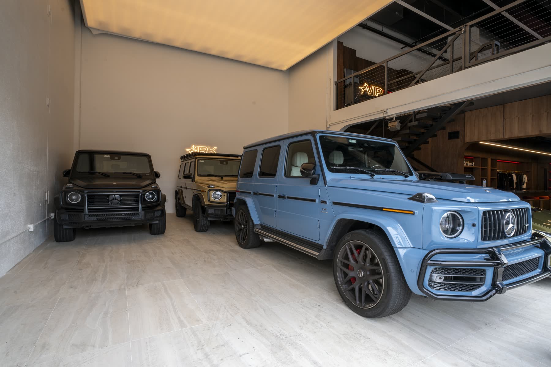 Mercedes G-Class vehicles parked in the Safe House ground-floor garage