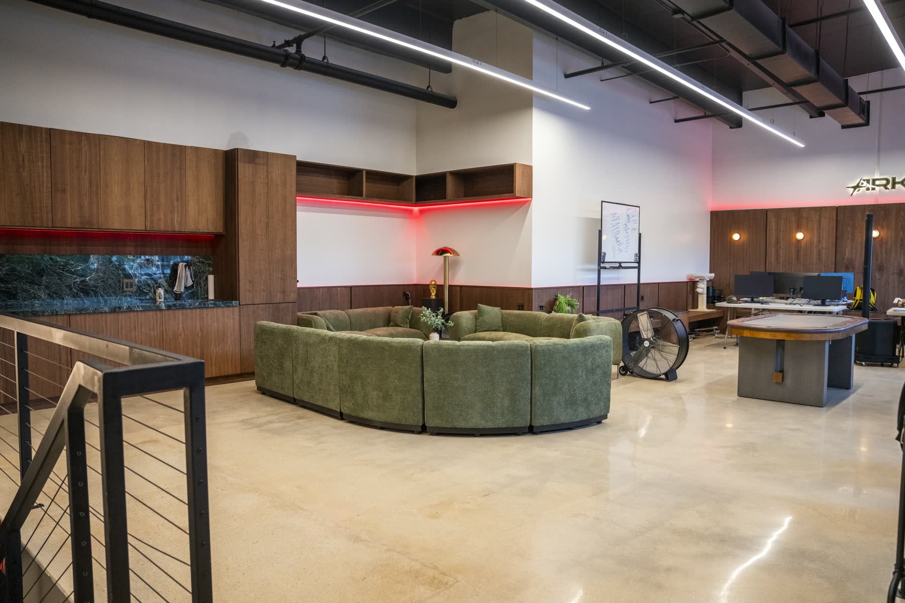 Open upstairs lounge and shared workspace inside the Safe House